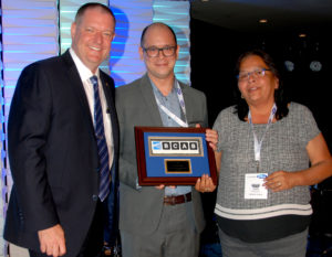 CMHA receives Humanitarian Award from BCAB president Kevin Gemmell (left)